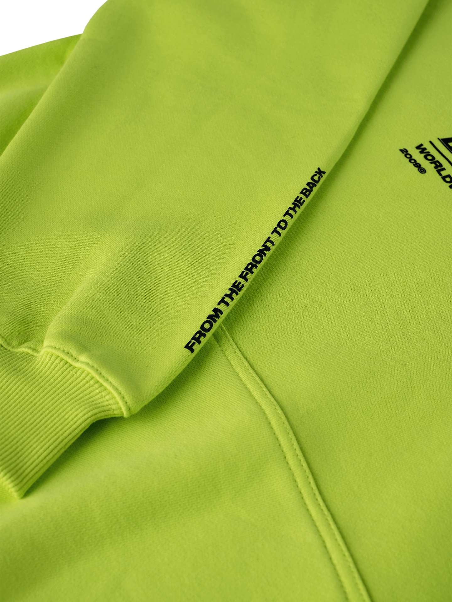 Rave Collective Green Hoodie -Close up shot of the forearm featuring black screen print with the lettering "From the front to the back"